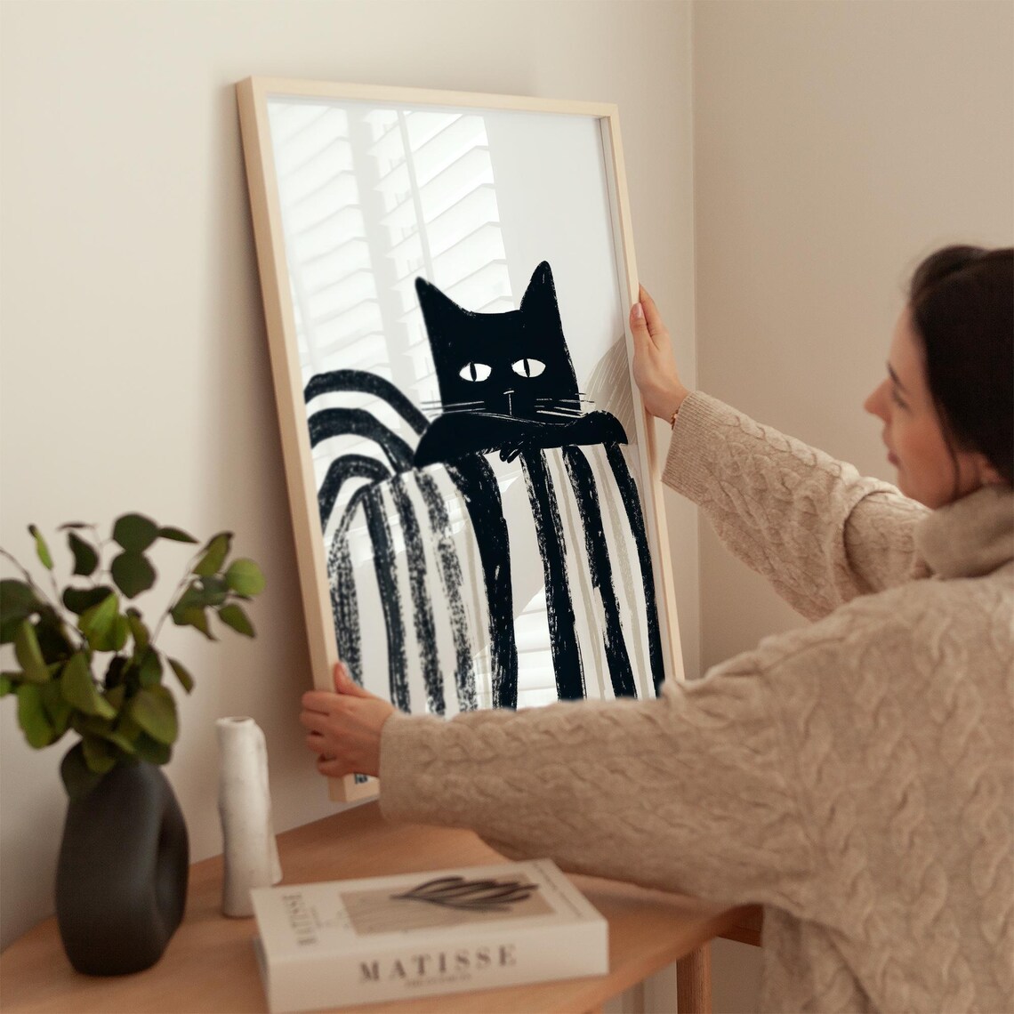Curious Black Cat Peeking Over Striped Blanket Artwork Poster - Image 2