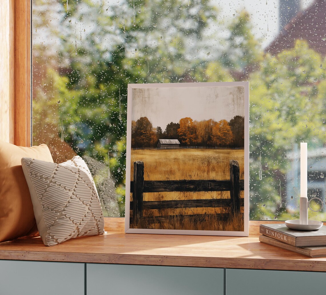 Rustic Old Barn Behind Dark Wooden Fence in Golden Field Poster - Image 2