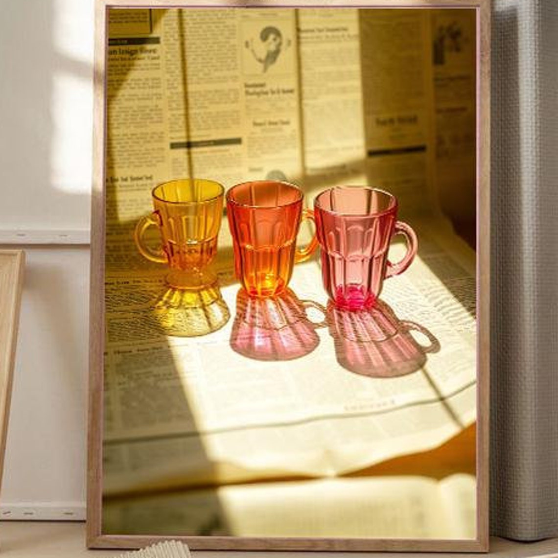 Amber Orange Pink Glass Cups Newspaper Sunlight Photo Poster