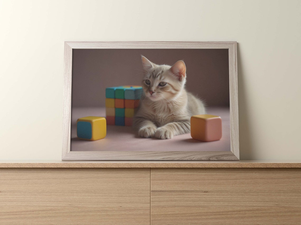 White Kitten Resting Among Bright Rainbow Building Blocks Poster - Image 2