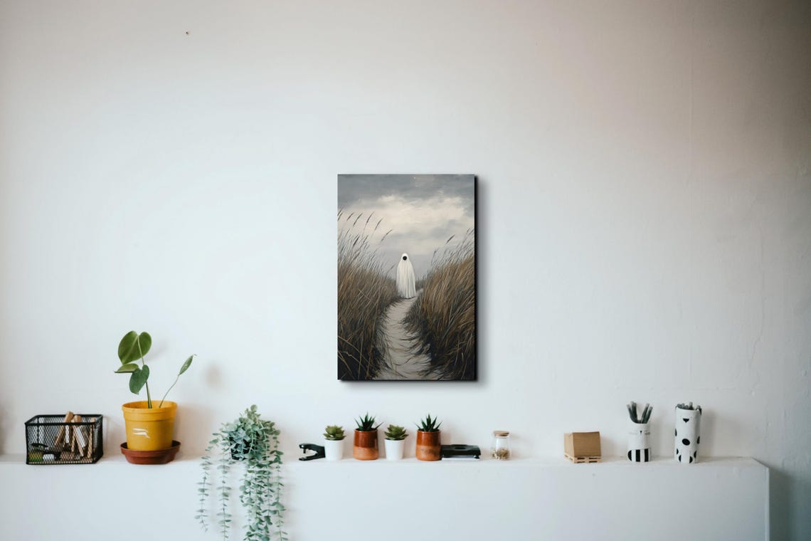 Lone Ghost Walking a Windswept Beach Dune Path Under Cloudy Sky Poster - Image 6