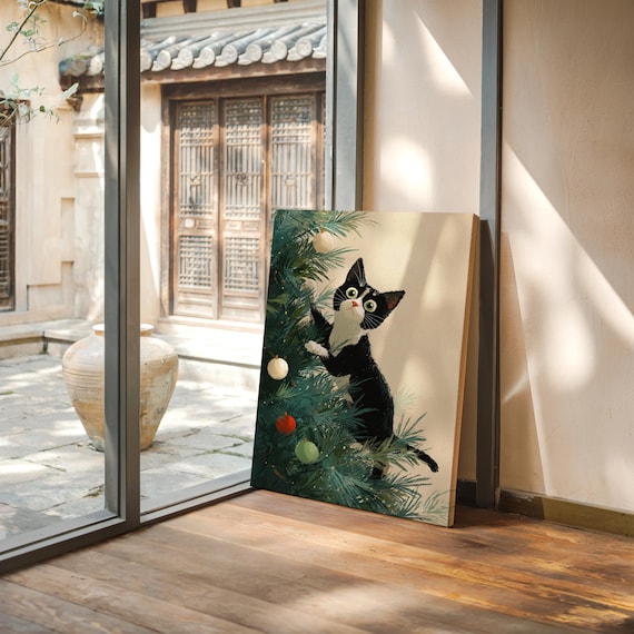 Black and White Tuxedo Cat Climbing a Decorated Christmas Tree Poster