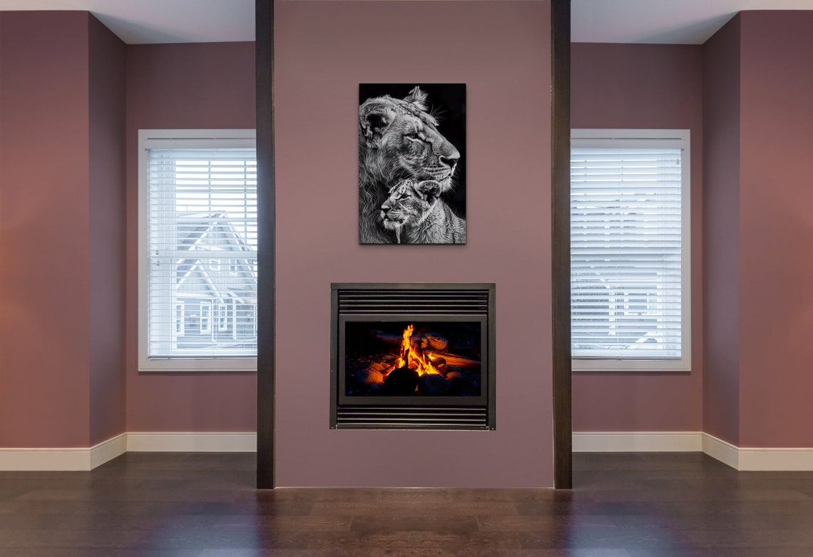 Black and White Lioness and Cub in Profile Beside Branches Poster - Image 5