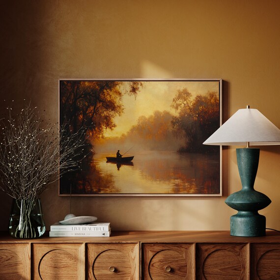 Lone Fisherman in a Boat on a Golden River at Sunset Tranquil Poster