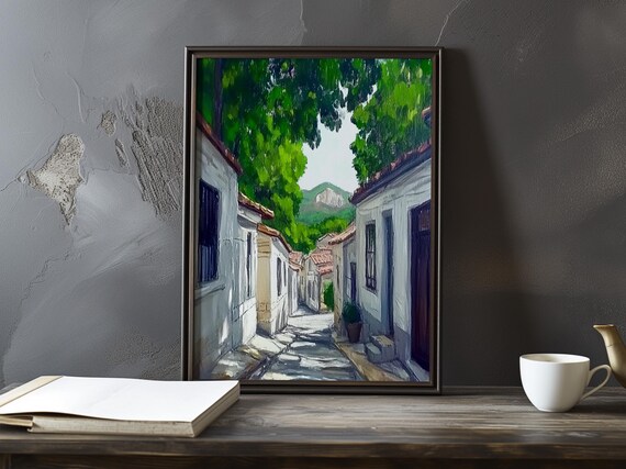 Shaded Village Lane With White Houses And A Distant Mountain Poster