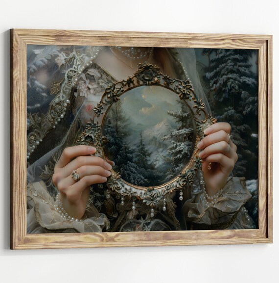 Woman Holding Ornate Mirror Showing Snowy Mountain Forest Art Poster