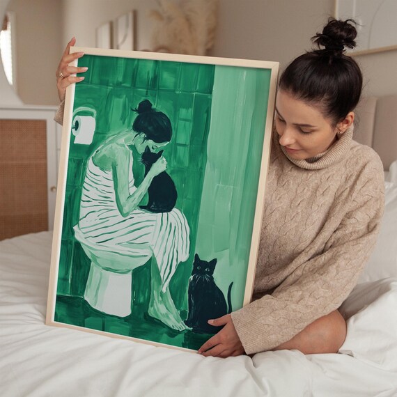 Woman Cuddling Black Cat with Second Cat in Green Bathroom Poster