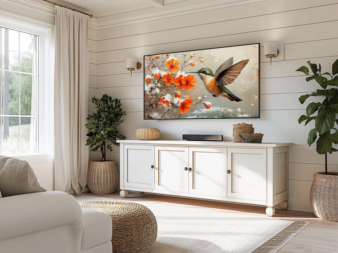Hummingbird In Flight Near Orange Blossoms Dusted With Snow Poster - Image 3