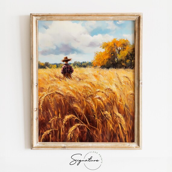 Lone Farmer Walking Through a Golden Wheat Field at Harvest Poster