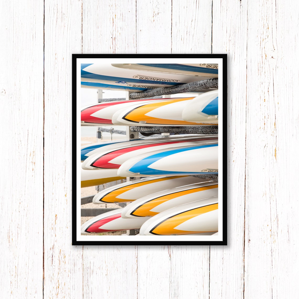 Colorful Paddle Race Boards Stacked on Rack Beach Lifestyle Poster - Image 2