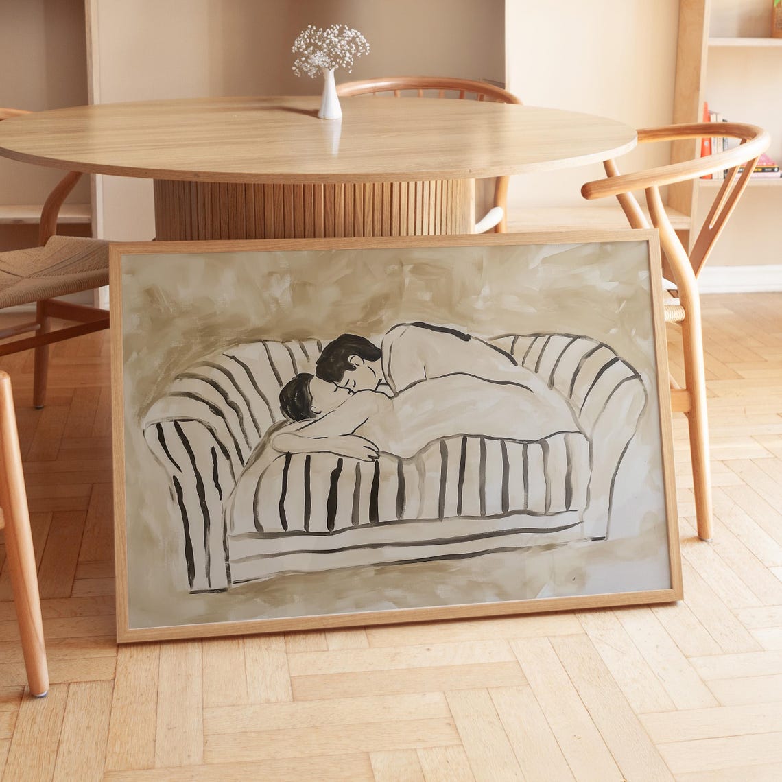 Couple Embracing on Striped Sofa Minimalist Ink Sketch Poster