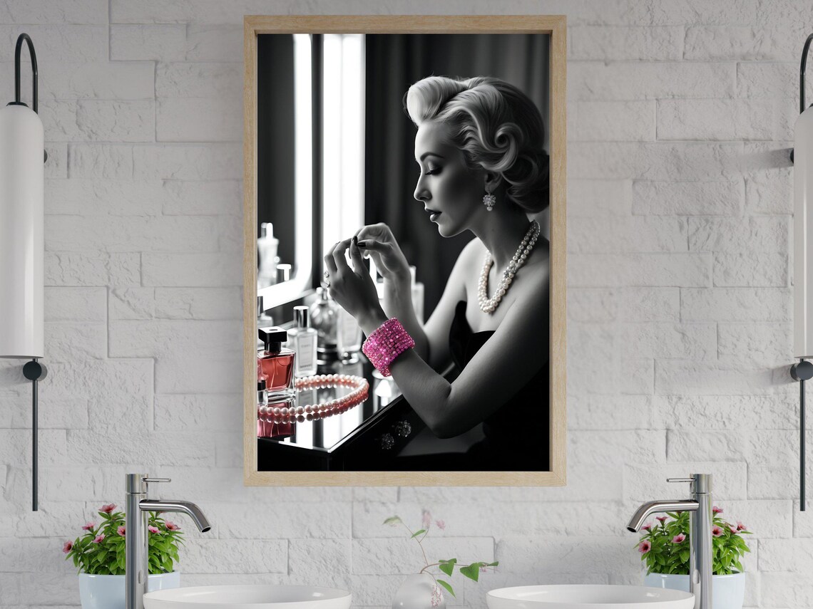 Elegant Woman Applying Lipstick At Vanity With Pearl Necklace Poster