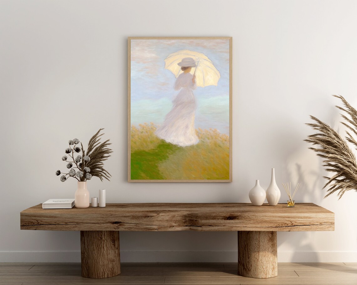 Woman in Flowing White Dress With Parasol in a Sunny Meadow Poster - Image 3