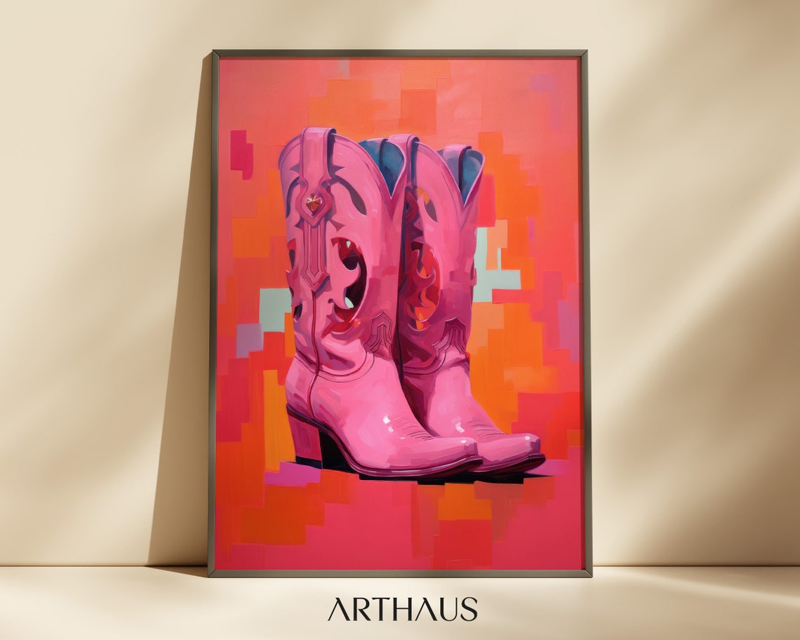 Pink Cowboy Boots Against A Blazing Orange Sunset Sky Art Print