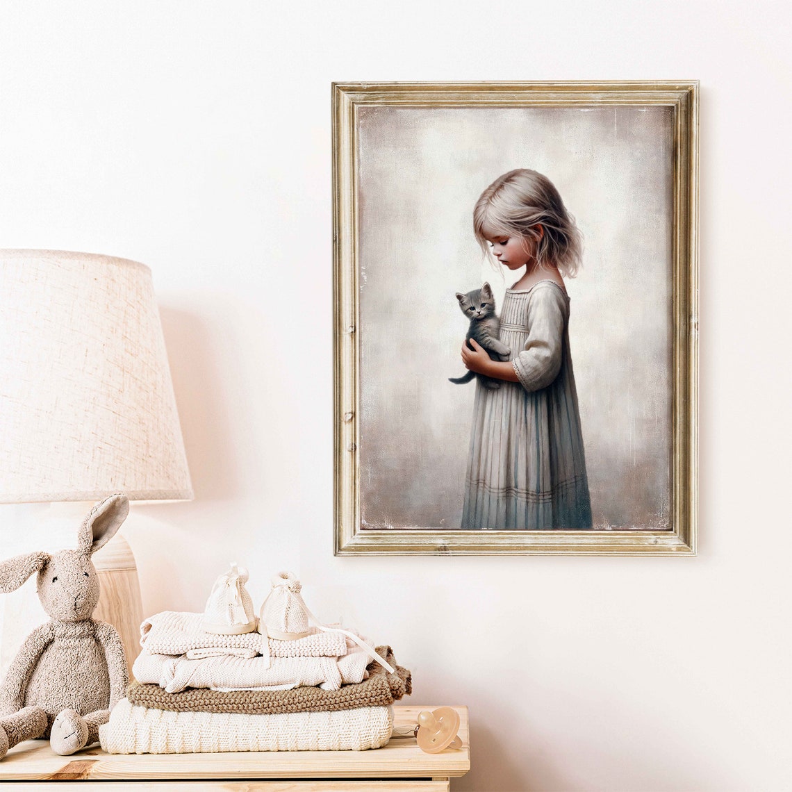 Gentle Young Girl Cradling a Gray Kitten in Soft Light Poster - Image 2