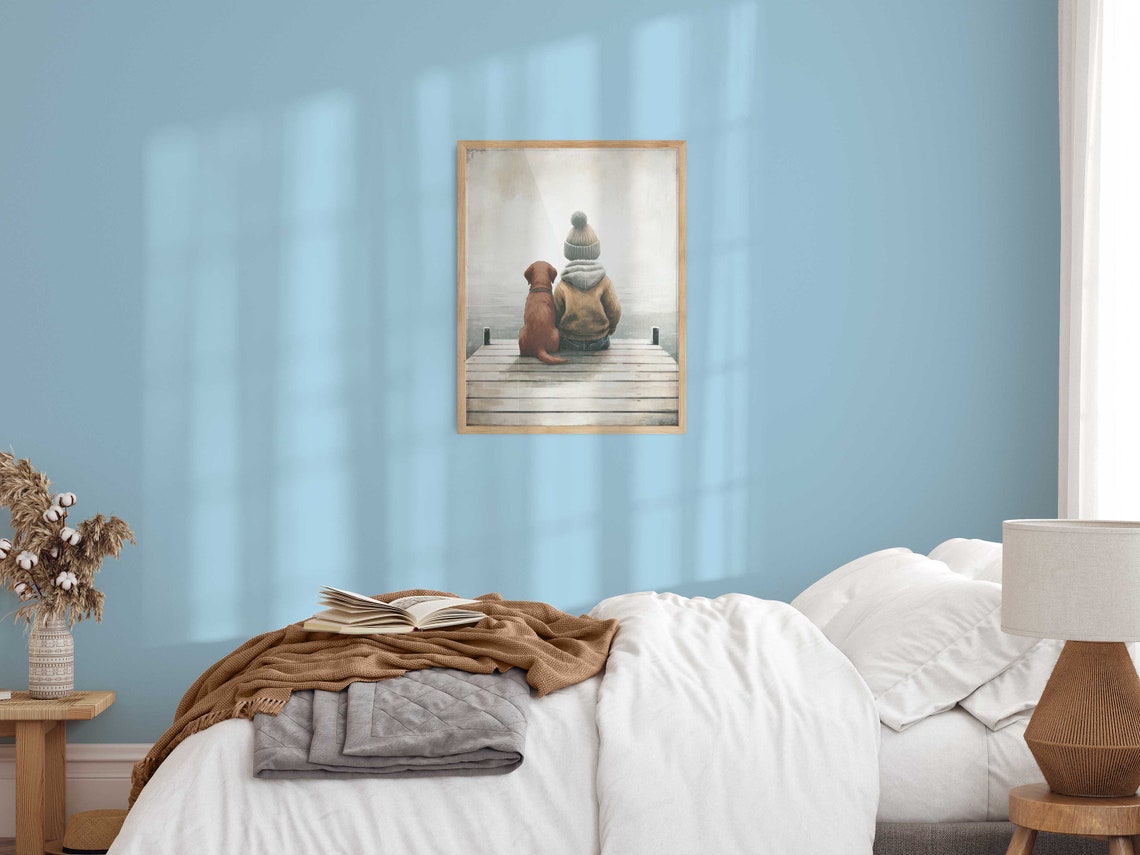 Young Boy And His Dog Sitting On Wooden Dock Over Water Poster - Image 2