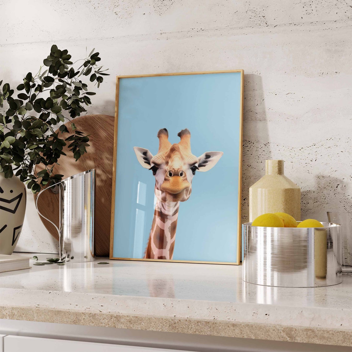 Baby Giraffe Looking Up at Camera on Bright Blue Background Poster - Image 2