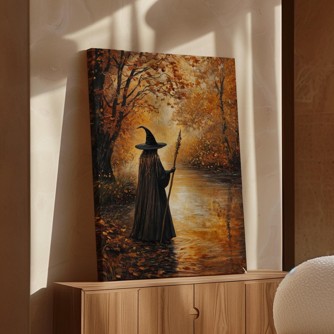 Mystical Witch Walking Along a Golden River in Autumn Forest Poster