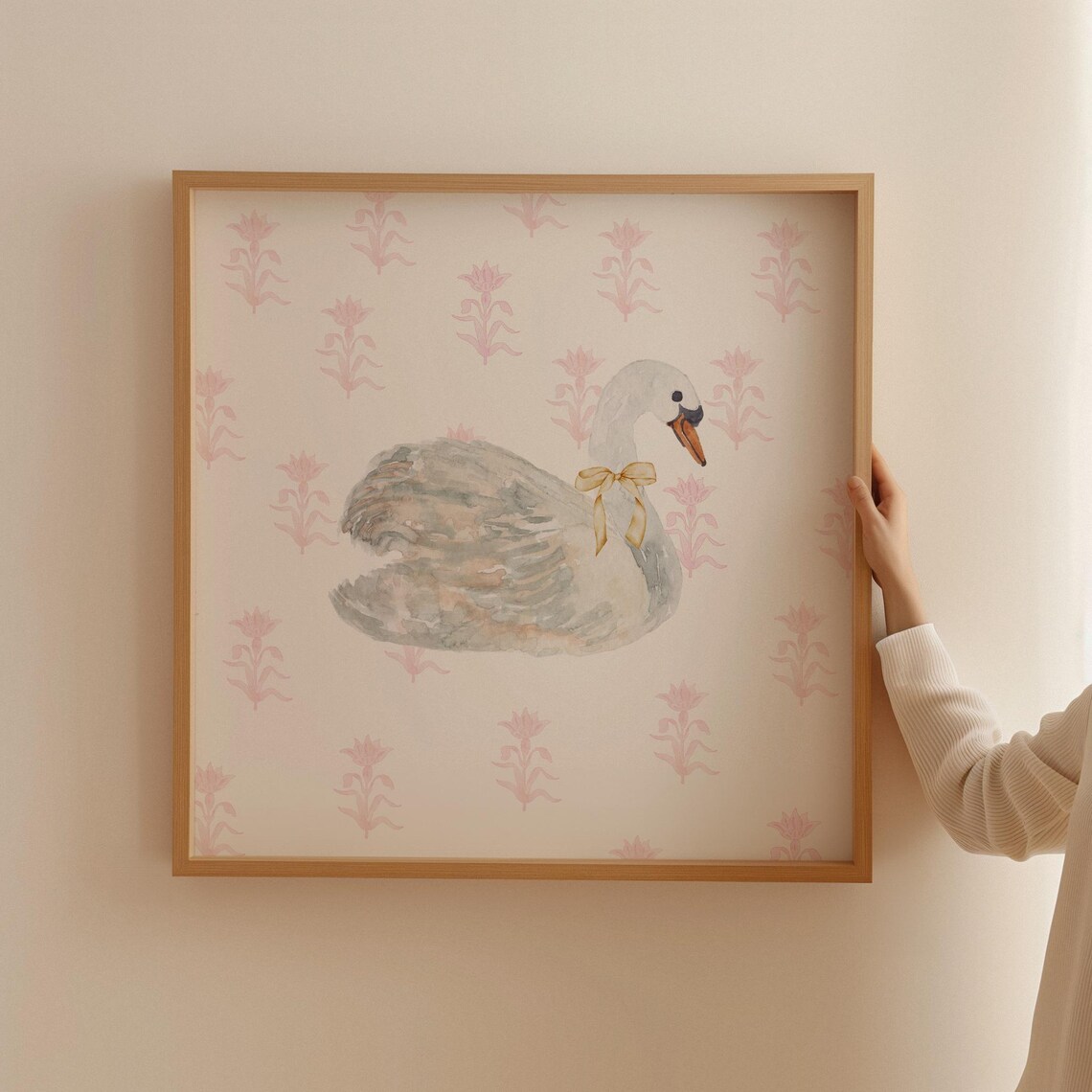 Graceful White Swan with Yellow Bow on Pink Floral Wallpaper Poster - Image 2
