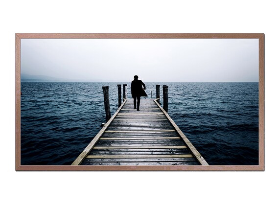 Solitary Figure Walking Wooden Pier Into Misty Dark Sea Moody Poster