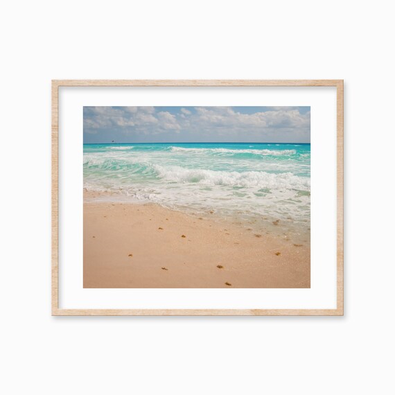 Turquoise Ocean Waves Rolling Onto a Sandy Beach Shore Poster