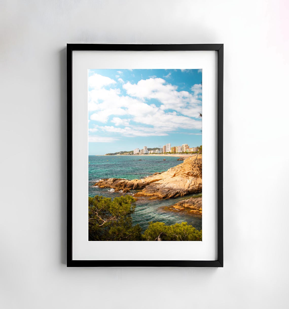 Rocky Mediterranean Coast with Sunny Beach Town Skyline Poster