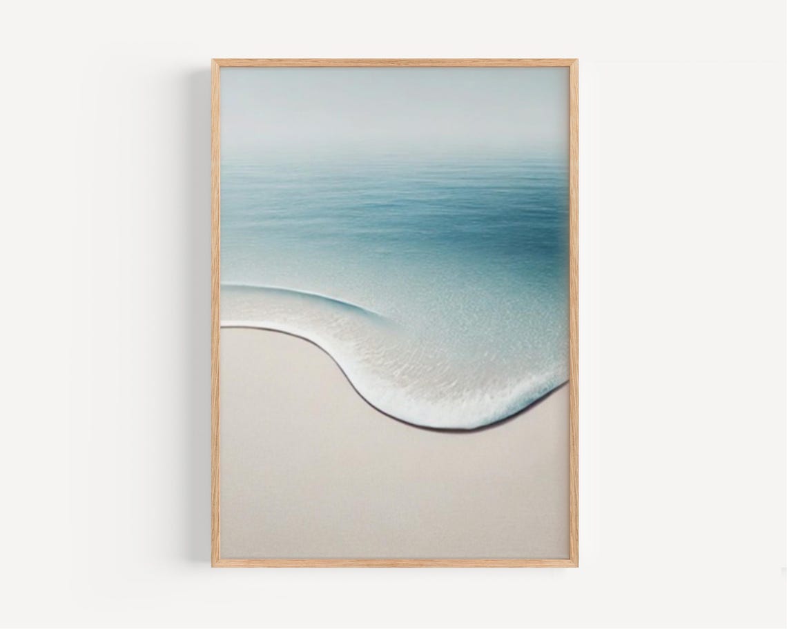 Gentle Turquoise Ocean Wave Washing Over Pale Sandy Shore Poster