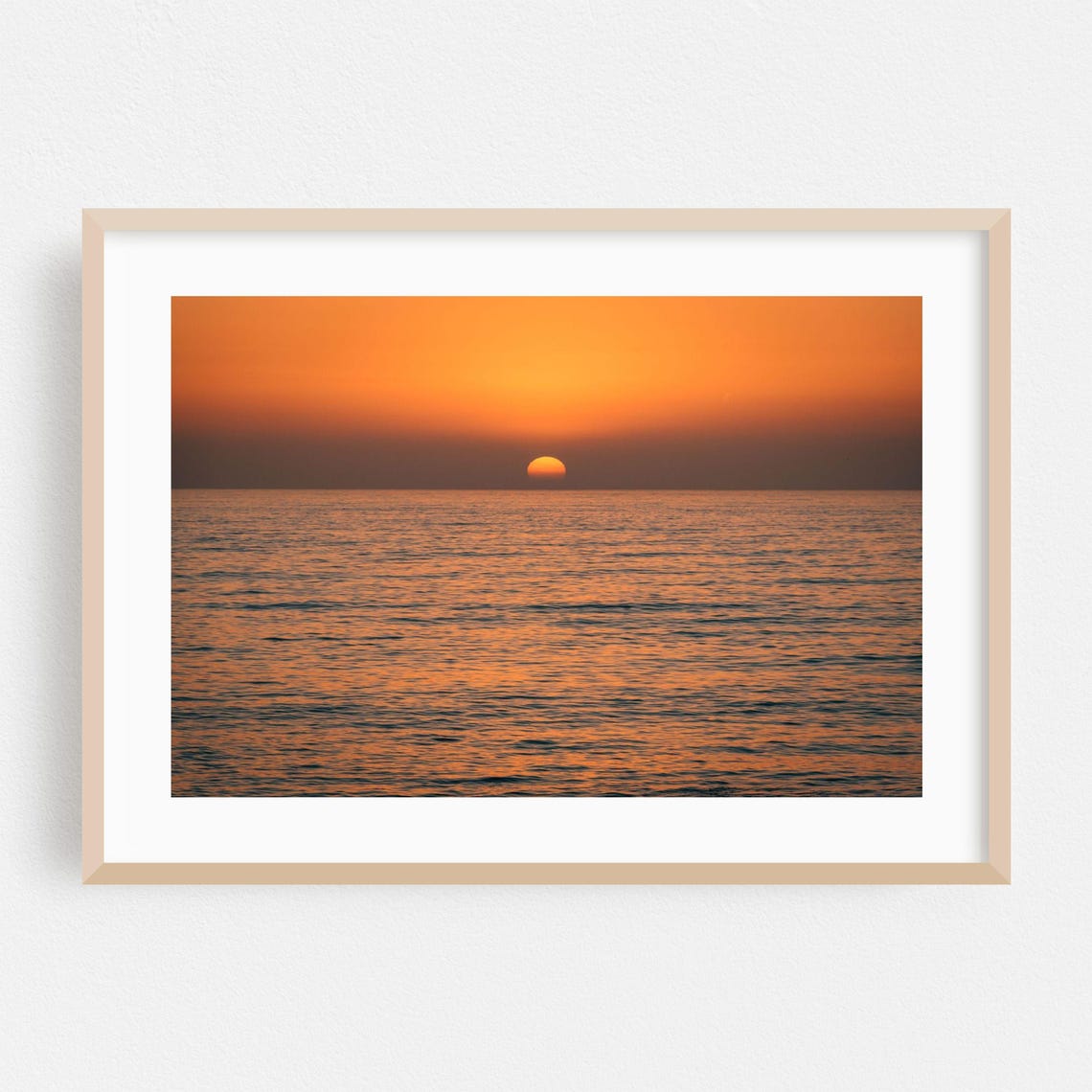 Minimalist Ocean Sunset Poster with Calm Waves and Warm Horizon Glow