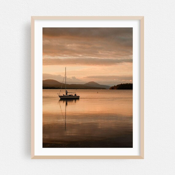 Sailboat At Sunset On Calm Lake With Mountain Silhouettes Poster