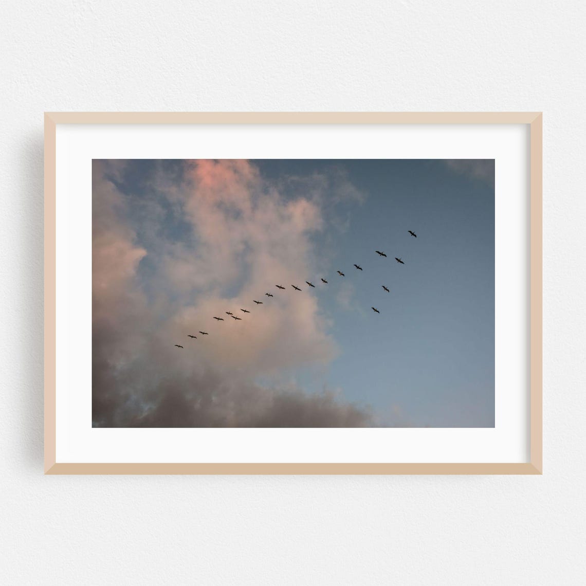 Birds In Formation Across Cloudy Sunset Sky Minimalist Nature Poster