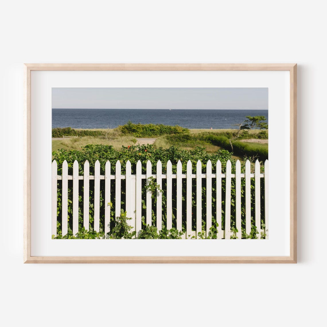 White Picket Fence Framing a Sunny Dune and Ocean View Poster