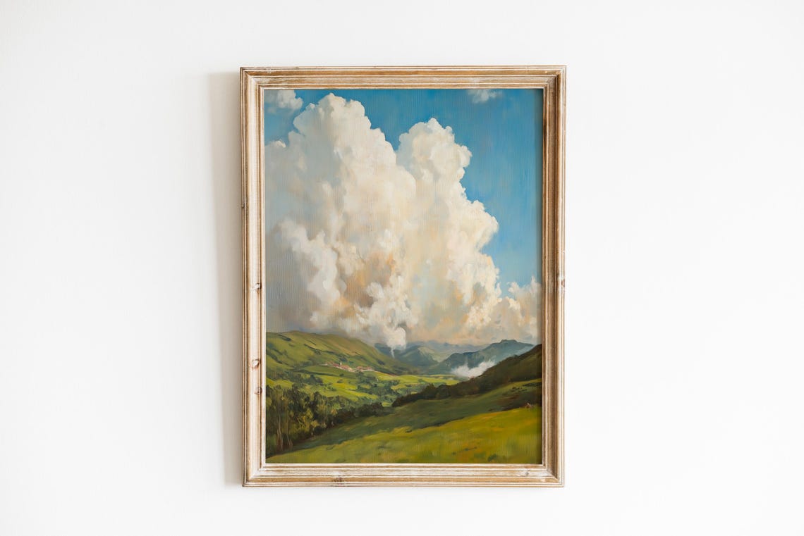 Towering Cumulus Clouds Over Green Rolling Hills Landscape Poster