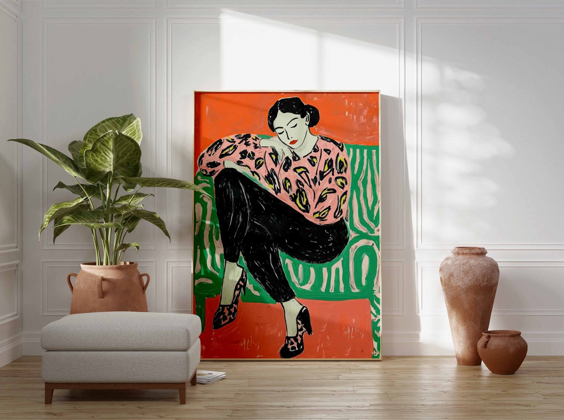 Seated Woman Pink Leafy Blouse Black Pants Modern Style Poster - Image 2