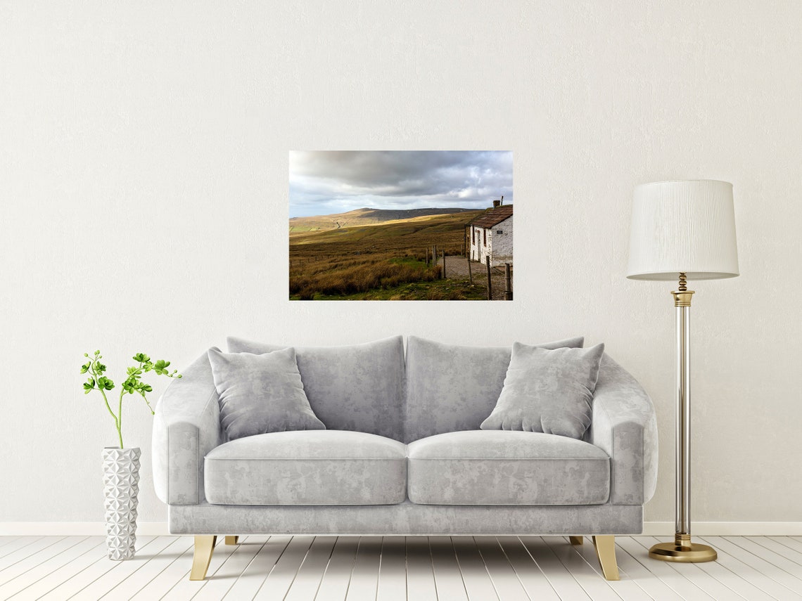 Weathered Stone Bothy Standing Alone on a Windswept Moorland Poster - Image 2