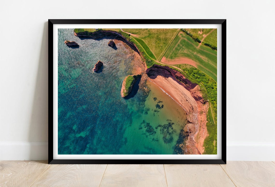 Ladram Bay Beach Devon Aerial Red Cliffs And Sea Stacks Poster