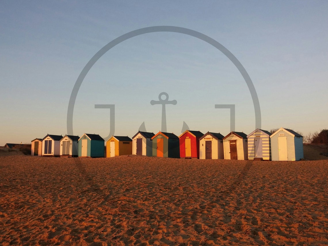 Colorful Beach Huts Row on Golden Sand at Dusk Coastal Poster - Image 3