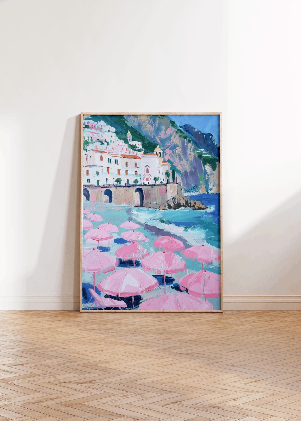 Sunlit Mediterranean Cliff Town With Pink Beach Umbrellas Poster - Image 2