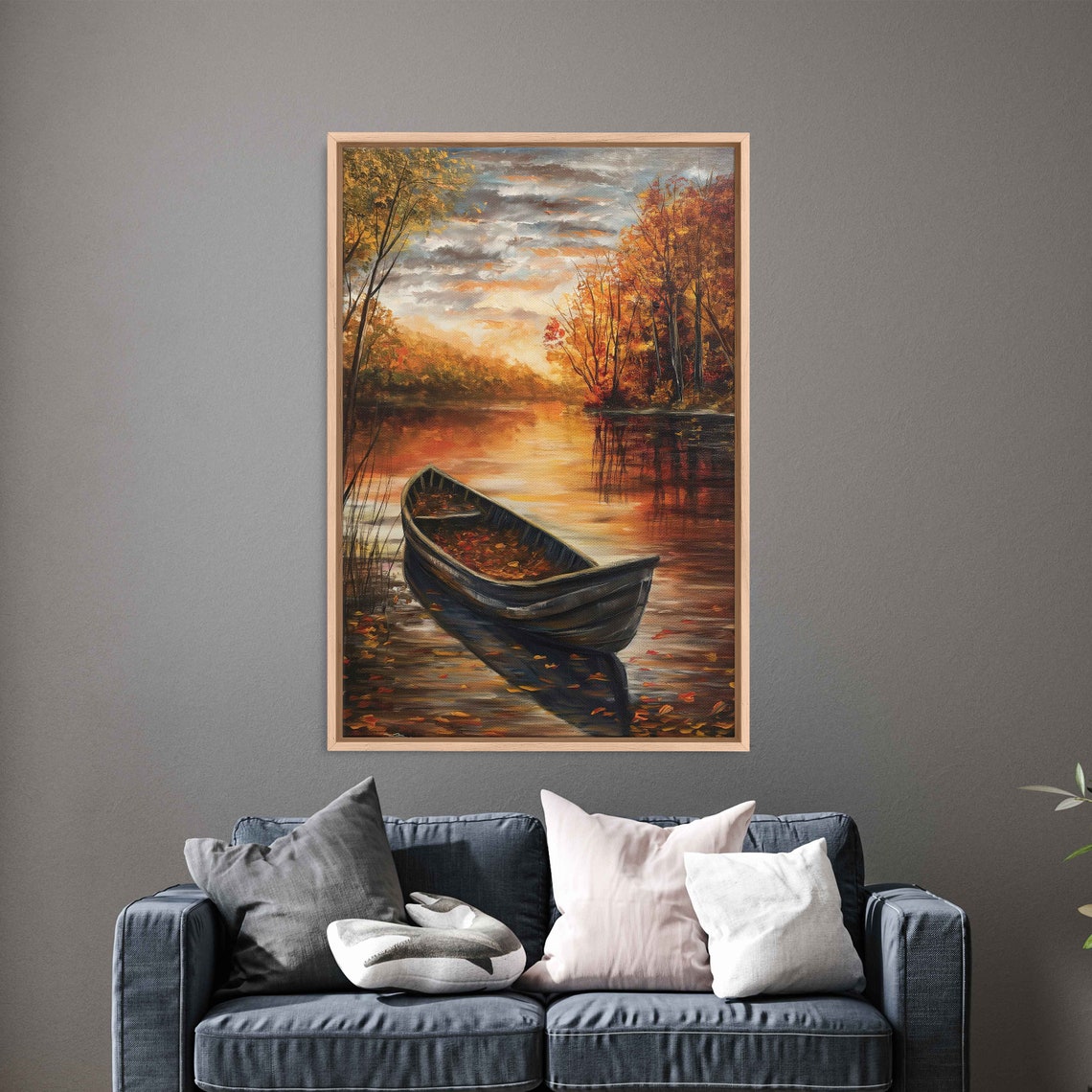 Wooden Canoe Filled With Leaves On Autumn River At Sunset Poster