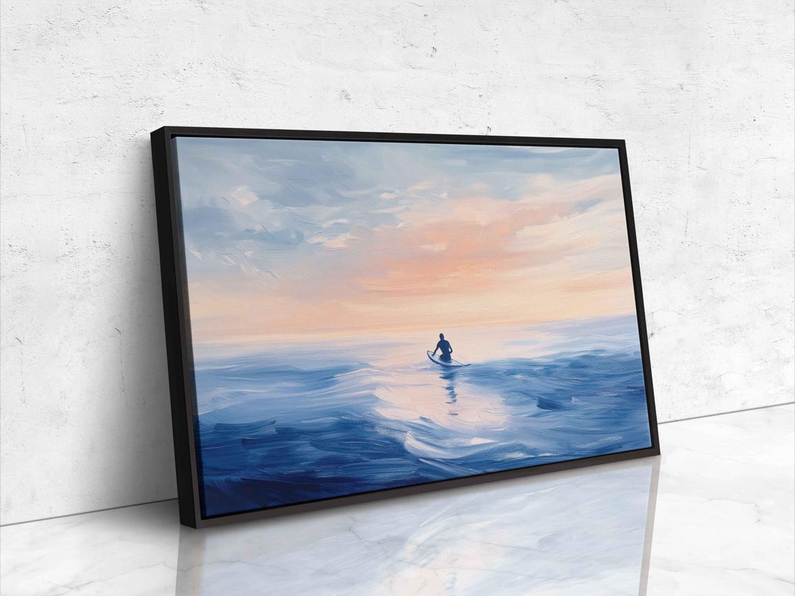 Surfer Paddling Across Serene Blue Ocean At Peach Sunrise Poster - Image 4