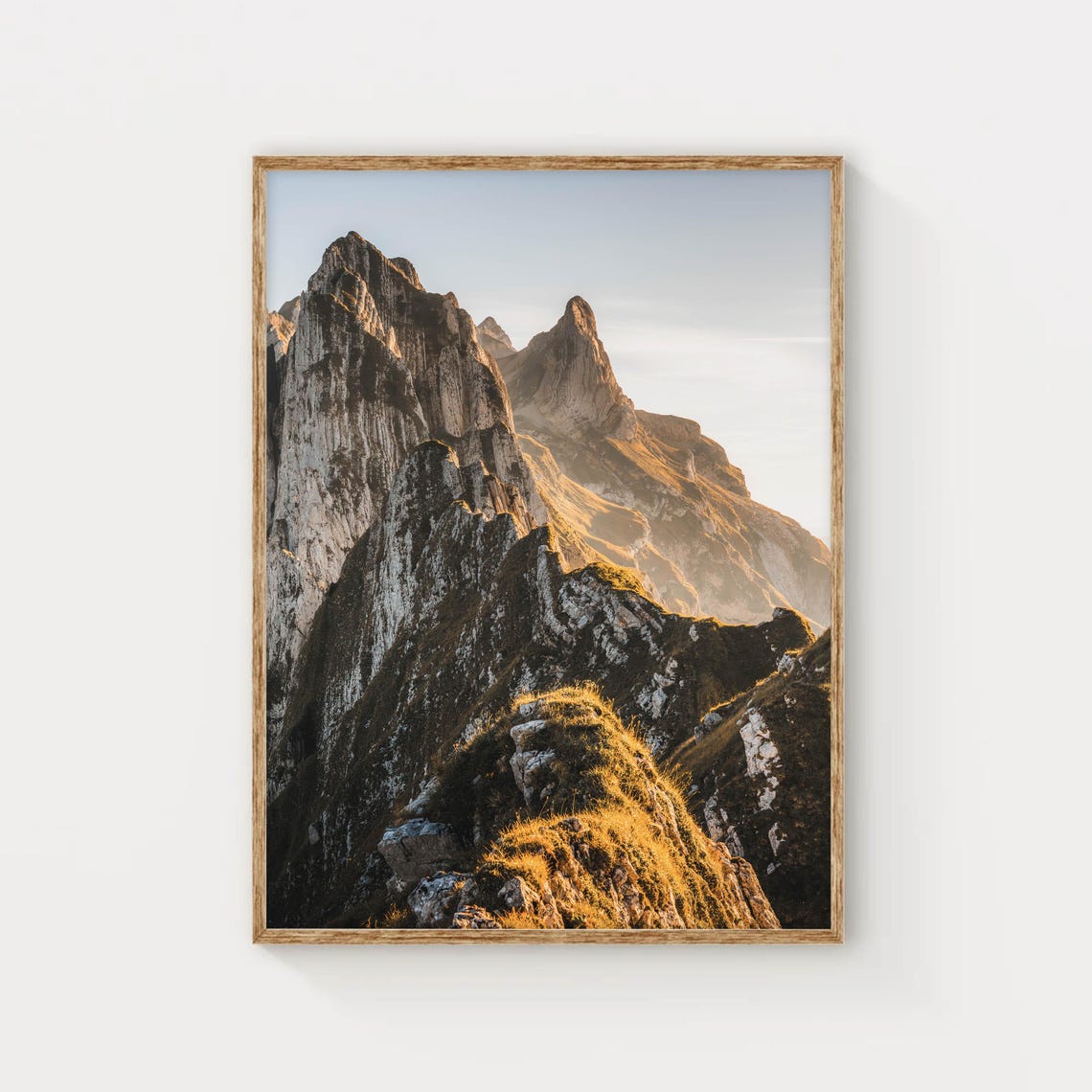 Rugged Rocky Mountain Peaks Glowing in Golden Sunset Light Poster