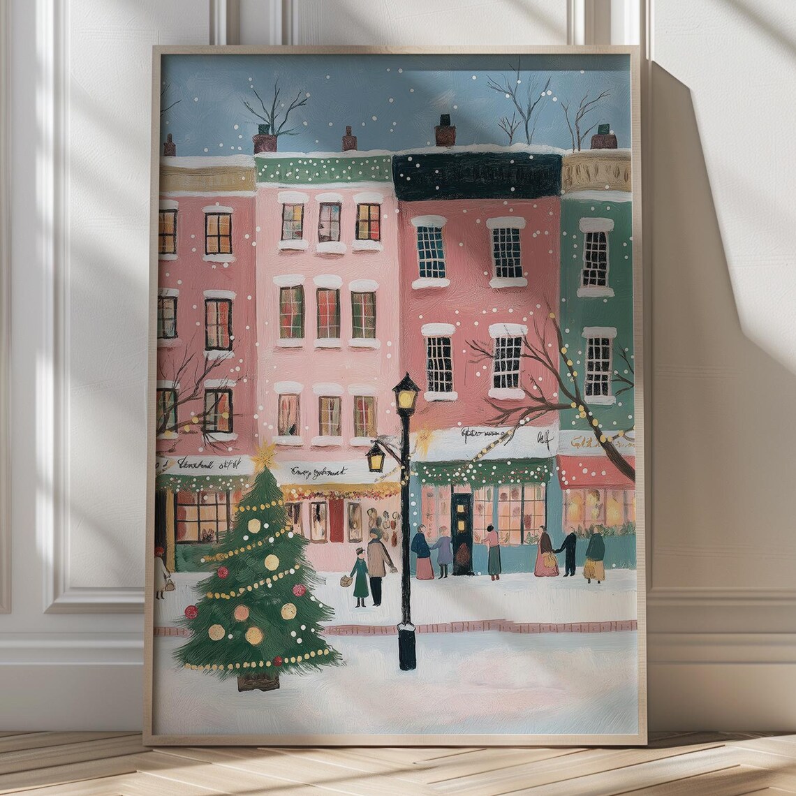 Snowy Christmas Street With Pink Buildings And Decorated Tree Poster