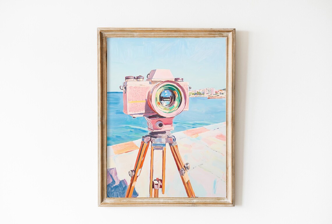 Pink Vintage Film Camera On Tripod Facing Blue Sea Coastal Poster