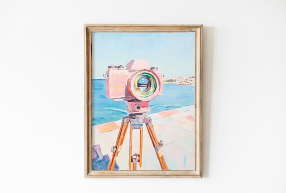 Pink Vintage Film Camera On Tripod Facing Blue Sea Coastal Poster