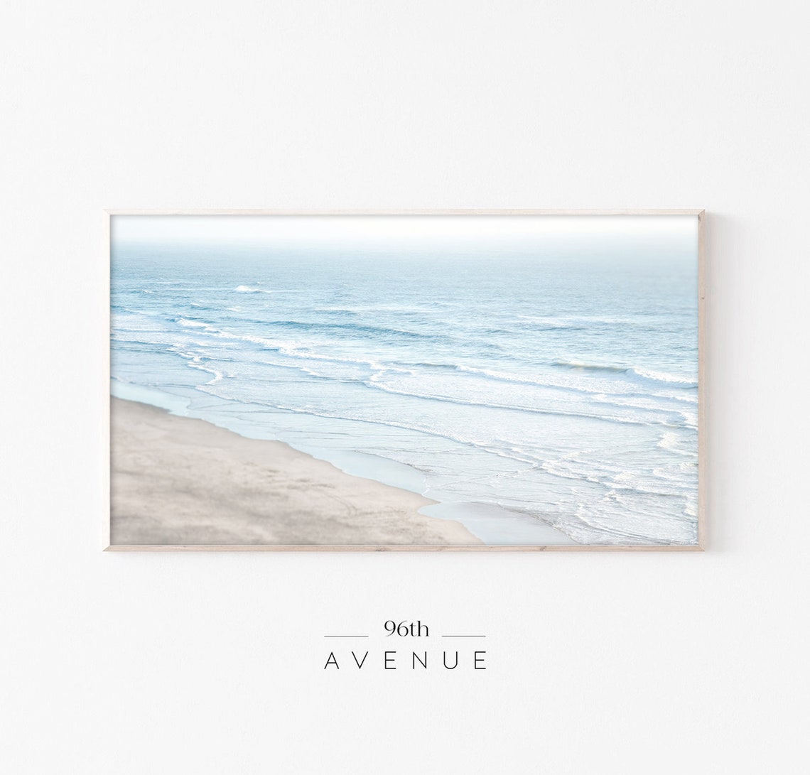 Calm Blue Rippling Water Over Wet Sandy Shoreline Aerial Poster