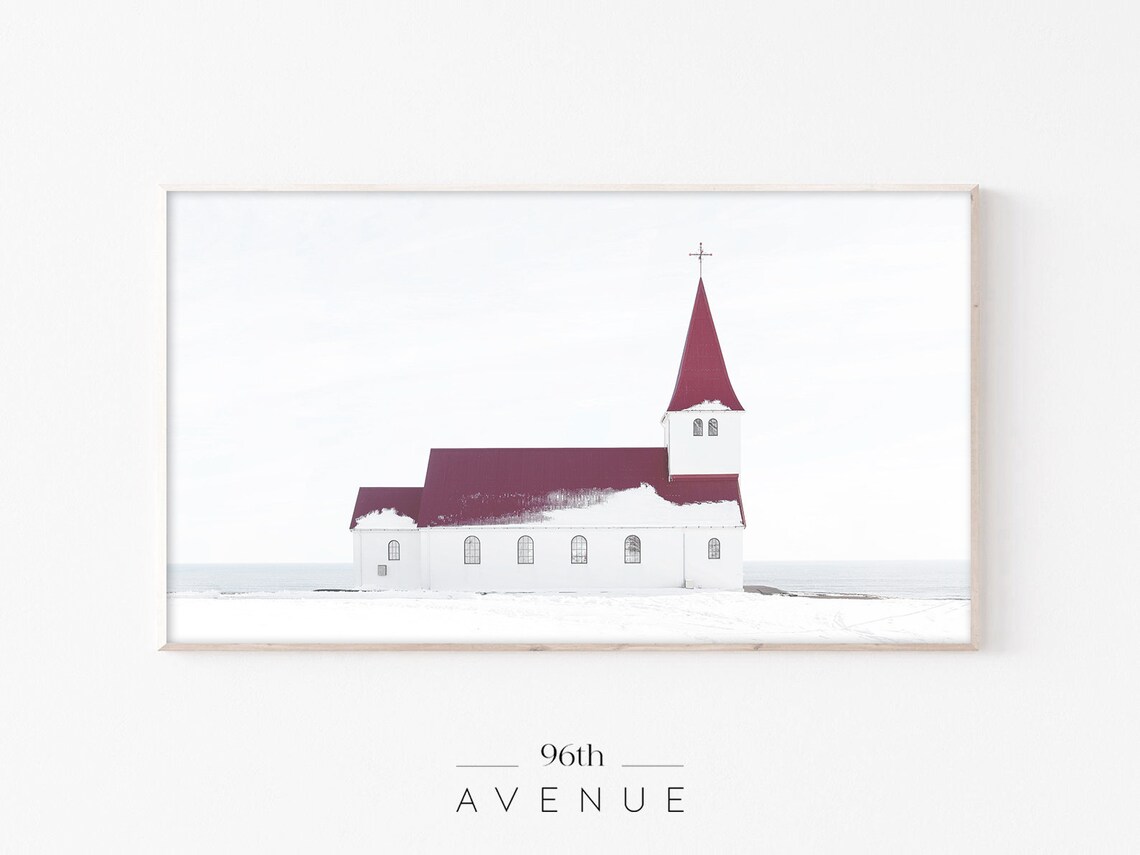 White Country Church With Red Roof in Snowy Winter Landscape Poster