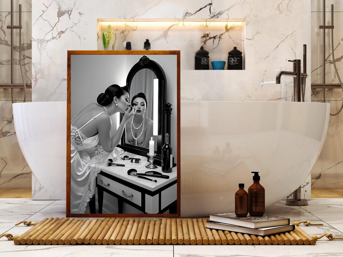 Woman Applying Makeup at a Vanity Mirror in Black and White Poster - Image 5