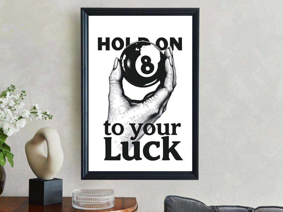 Hand Holding an 8 Ball With Hold On To Your Luck Quote Typography Poster