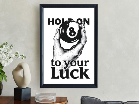 Hand Holding an 8 Ball With Hold On To Your Luck Quote Typography Poster