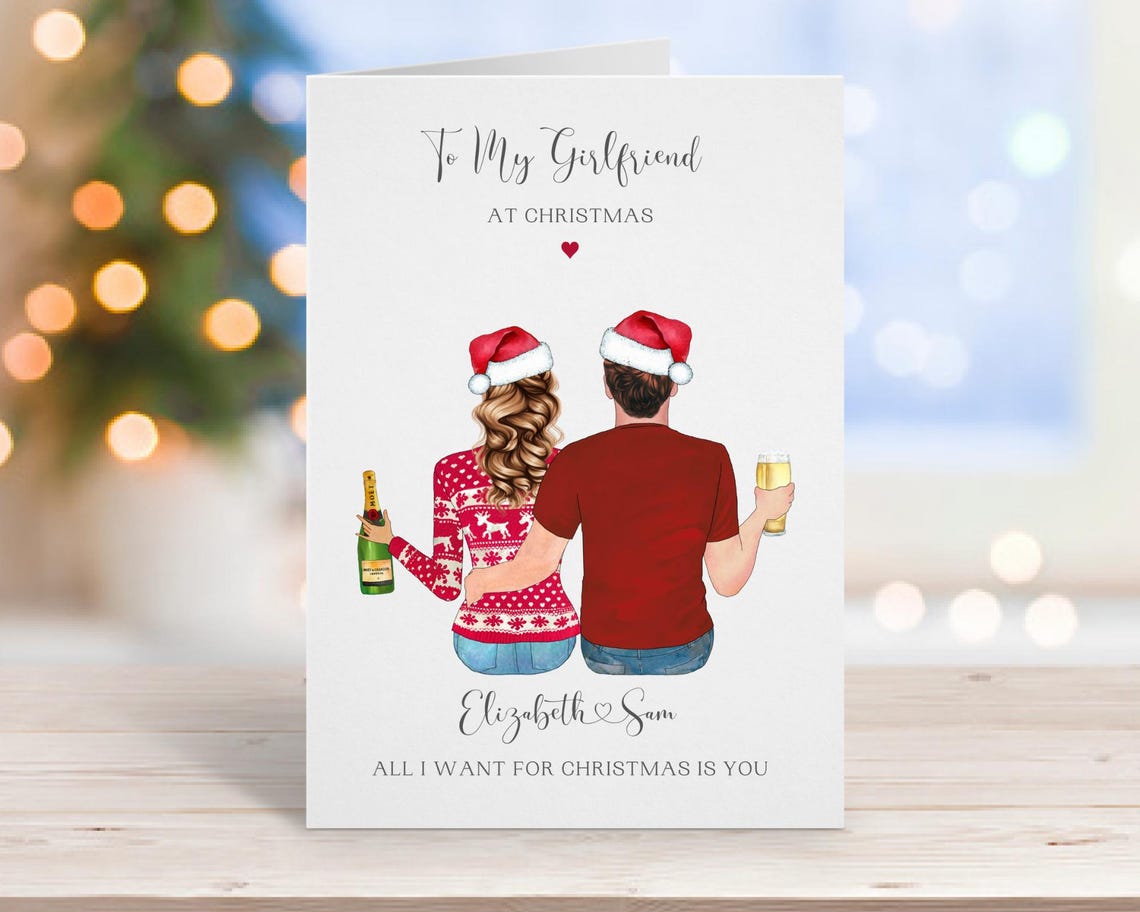 To My Girlfriend At Christmas Card Couple Champagne Santa Hats Print