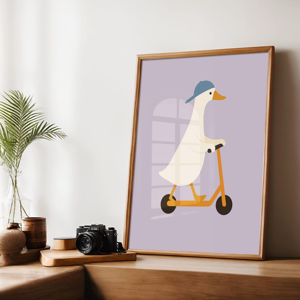 Silly Goose Riding Orange Scooter with Blue Cap Purple Print